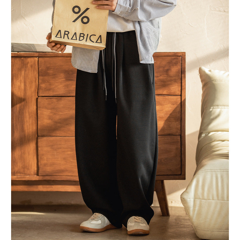 Casual Pants With A Pleated Waistband And Dual Drawstrings