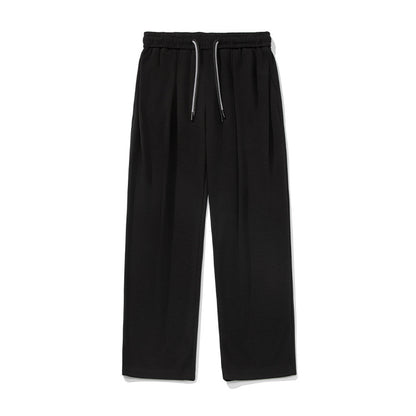 Casual Pants With A Pleated Waistband And Dual Drawstrings